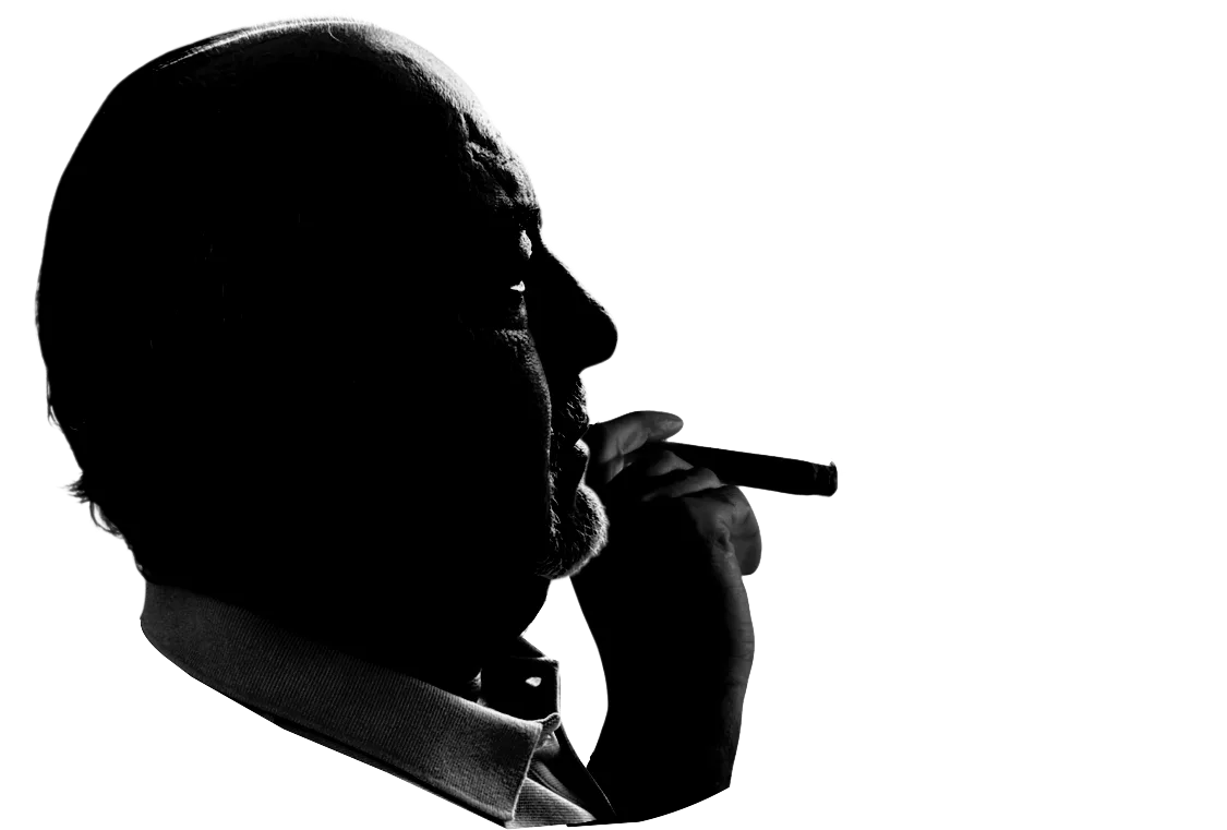 Silhouette of a man enjoying a cigar